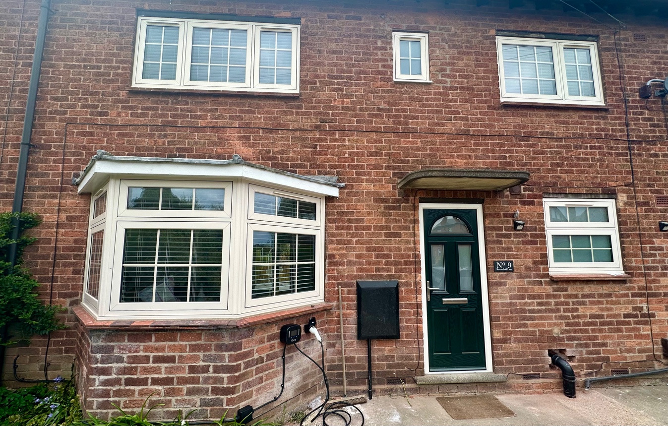 Residence 7 flush sash windows with bay and composite door on period terrace, Nottinghamshire
